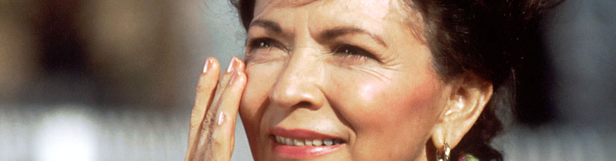 A woman using sunscreen.